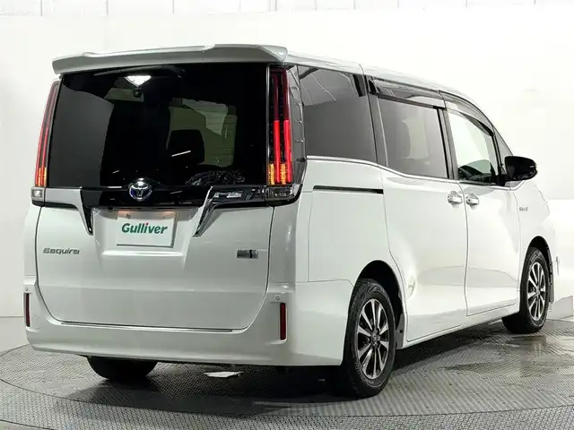 トヨタ エスクァイア ハイブリッド Gi 大阪府 2017(平29)年 5.4万km ホワイトパールクリスタルシャイン 社外エアロ 黒革シート 純正9incナビTV バックカメラ フリップダウンモニター シートヒーター クルーズコントロール 衝突軽減ブレーキ レーンアシスト オートハイビーム 両側パワースライドドア 前後ドライブレコーダー ETC