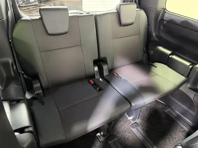 トヨタ エスクァイア ハイブリッド Gi 大阪府 2017(平29)年 5.4万km ホワイトパールクリスタルシャイン 社外エアロ 黒革シート 純正9incナビTV バックカメラ フリップダウンモニター シートヒーター クルーズコントロール 衝突軽減ブレーキ レーンアシスト オートハイビーム 両側パワースライドドア 前後ドライブレコーダー ETC