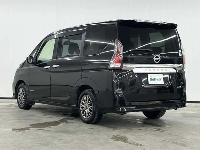 日産 セレナ X Vセレクション 長崎県 2017(平29)年 9.1万km ダイヤモンドブラック 純正9インチナビ/CD/DVD/BT/フルセグ/純正フリップダウンモニター/バックカメラ/エマージェンシーブレーキ/・レーンディパーチャーアラート/・誤発信抑制/両側パワースライドドア/クルーズコントロール/社外15インチアルミホイール/アイドリングストップ/USBポート/純正ドライブレコーダー/純正ビルトインETC/ＨＤＭＩ端子/シートリフター/リアサンシェード/シートバックテーブル/バイザー/オートライト/スマートキー
