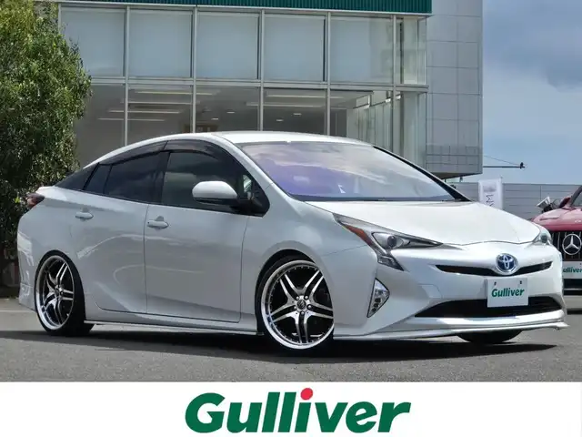 トヨタ プリウス S 鹿児島県 2016(平28)年 6.7万km ホワイトパールクリスタルシャイン Ｂｅｓｔｉ車高調　/ＦＩＲＥＮＺＥアルミホイール（１９インチ）　/社外ハンドル　/社外リアトランクスポイラー　/社外スポイラー（フロント／サイド）　/フロントガラスオーロラフィルム施工　/フェンダー曲げ加工/ALPINEナビ(X9S)/ビルトインETC/Bluetoothオーディオ/フルセグテレビ/バックカメラ/プッシュスタート/スマートキー/前後コーナーセンサー/横滑り防止装置/LEDヘッドライト/カーテンエアバッグ/エアバッグ(W+サイド)