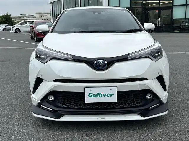 トヨタ Ｃ－ＨＲ G 奈良県 2018(平30)年 4.3万km ホワイトパールクリスタルシャイン フルセグナビ（ＮＳＺＴ－Ｙ６６Ｔ）　/ＨＤＭＩ　/ＣＤ／ＤＶＤ　/ＵＳＢ　/バックカメラ　/ビルトインＥＴＣ　/スペアキー　/レーダークルーズコントロール　/デジタルインナーミラー　/ブラインドスポットモニター　/前後ドライブレコーダー　/電動パーキングブレーキ　/ブレーキホールド　/フロアマット　/ハーフレザーシート　/シートヒーター　/純正アルミホイール　/TRDエアロ