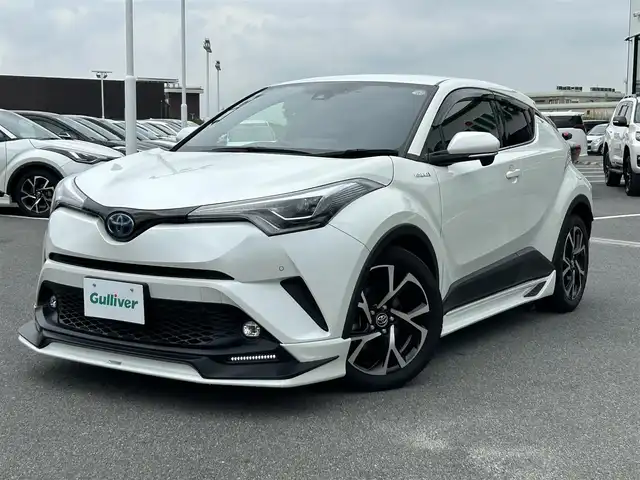 トヨタ Ｃ－ＨＲ G 奈良県 2018(平30)年 4.3万km ホワイトパールクリスタルシャイン フルセグナビ（ＮＳＺＴ－Ｙ６６Ｔ）　/ＨＤＭＩ　/ＣＤ／ＤＶＤ　/ＵＳＢ　/バックカメラ　/ビルトインＥＴＣ　/スペアキー　/レーダークルーズコントロール　/デジタルインナーミラー　/ブラインドスポットモニター　/前後ドライブレコーダー　/電動パーキングブレーキ　/ブレーキホールド　/フロアマット　/ハーフレザーシート　/シートヒーター　/純正アルミホイール　/TRDエアロ