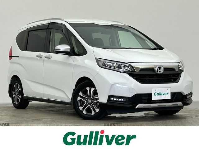 ホンダ フリード クロスター 宮城県 2023(令5)年 3.4万km プラチナホワイトパール ワンオーナー/寒冷地仕様/両側パワースライドドア/純正ナビ/(AM/FM/CD/DVD/TV/iPod/SD/USB/BT/AUX)/バックカメラ/ETC/前方ドライブレコーダー/ホンダセンシング/レーダークルーズコントロール/ハーフレザー/シートヒーター/ワイパーデアイサー/プッシュスタート/スマートキー/スペアキー/オートライト/LEDヘッドライト/フォグランプ/ドアバイザー/純正フロアマット/純正15インチアルミホイール