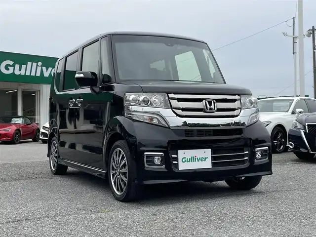 ホンダ Ｎ ＢＯＸ カスタム G ターボ Lパッケージ 千葉県 2016(平28)年 6万km スマートブラック あんしんパッケージ/・衝突軽減ブレーキ/・サイド＆カーテンエアバッグ/純正ディスプレイオーディオ【WX-151C】/バックカメラ/両後パワースライドドア/ハーフレザーシート/クルーズコントロール/スマートキー/パドルシフト/社外前後ドライブレコーダー【HDR360GW】/ビルトインETC/純正キセノンヘッドライト/フォグランプ/純正15インチアルミホイール/本革巻きステアリング