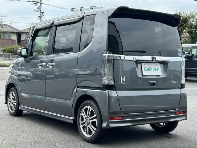 ホンダ Ｎ ＢＯＸ カスタム G Lパッケージ 愛媛県 2015(平27)年 6.1万km ポリッシュドメタルメタリック 純正7型ナビ(AM/FM/CD/DVD/BTワンセグTV)/左側電動スライド/ドライブレコーダー/バックカメラ/純正フロアマット/ステアリングリモコン/電格ミラー/純正ドアバイザー/シガーソケット/ISOFIX/フォグランプ/オートライト/ETC/現状サマー(純正AW)(155/65/R14)/TOYO SD-K7
