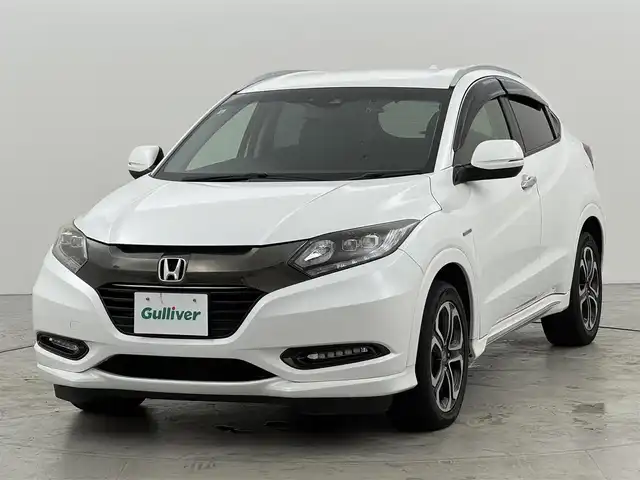 ホンダ ヴェゼル ハイブリッド Z ホンダセンシング 福岡県 2017(平29)年 5.8万km ホワイトオーキッドパール 社外ナビ／フルセグＴＶ　/バックカメラ　/ホンダセンシング　/衝突軽減ブレーキ　/レーンキープ　/ＥＣＯＮ　/ＥＴＣ　/ドラレコ　/パドルシフト　/ハーフレザーシート　/純正１７インチアルミホイール　/ＬＥＤヘッドライト
