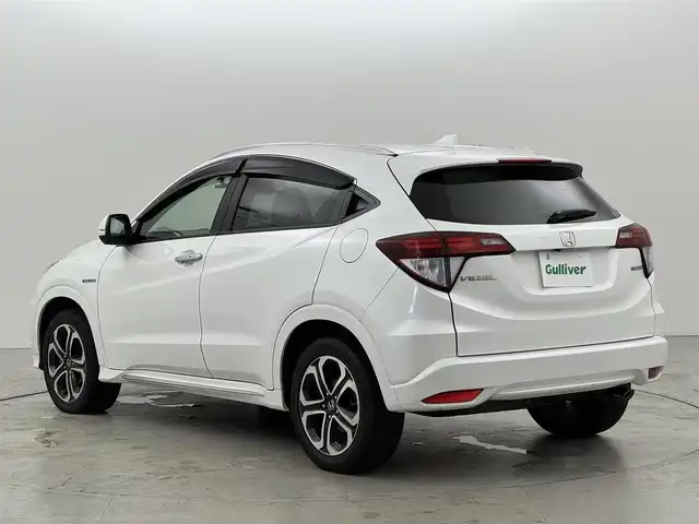 ホンダ ヴェゼル ハイブリッド Z ホンダセンシング 福岡県 2017(平29)年 5.8万km ホワイトオーキッドパール 社外ナビ／フルセグＴＶ　/バックカメラ　/ホンダセンシング　/衝突軽減ブレーキ　/レーンキープ　/ＥＣＯＮ　/ＥＴＣ　/ドラレコ　/パドルシフト　/ハーフレザーシート　/純正１７インチアルミホイール　/ＬＥＤヘッドライト