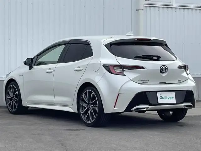 トヨタ カローラ スポーツ ハイブリッドG Z 愛媛県 2019(平31)年 4.6万km ホワイトパールクリスタルシャイン 純正ナビ　/AM/FM/CD/DVD/BT/フルセグ/バックカメラ　/車線逸脱防止装置　/衝突被害軽減装置　/ドライブレコーダー　/レーダークルーズコントロール　/ＬＥＤヘッドライト　/電動パーキングブレーキ　/ステアリングスイッチ　/ETC/アイドリングストップ/ヒートミラー/電格ミラー/現状サマー(純正AW)(225/40/R18)