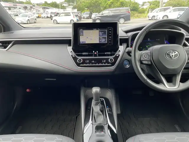 トヨタ カローラ スポーツ ハイブリッドG Z 愛媛県 2019(平31)年 4.6万km ホワイトパールクリスタルシャイン 純正ナビ　/AM/FM/CD/DVD/BT/フルセグ/バックカメラ　/車線逸脱防止装置　/衝突被害軽減装置　/ドライブレコーダー　/レーダークルーズコントロール　/ＬＥＤヘッドライト　/電動パーキングブレーキ　/ステアリングスイッチ　/ETC/アイドリングストップ/ヒートミラー/電格ミラー/現状サマー(純正AW)(225/40/R18)