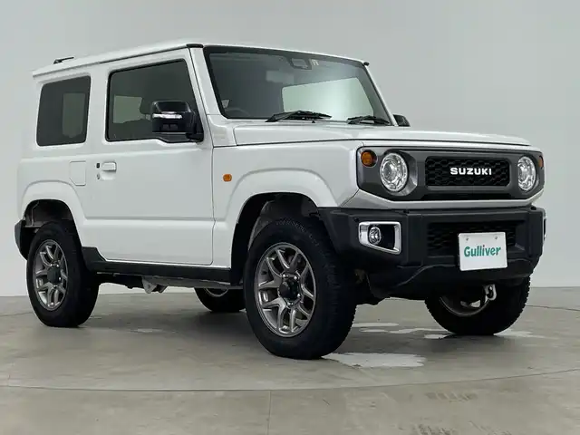 スズキ ジムニー XC 鹿児島県 2023(令5)年 1.1万km ピュアホワイトP 社外9インチメモリナビ/(BT/SD/CD/DVD/Applecarplay/Androidauto/フルセグTV)/衝突軽減ブレーキ/レーダークルーズコントロール/クルーズコントロール/前席シートヒーター/バックカメラ/レーンキープアシスト/オートマチックハイビーム/アイドリングストップ/4WD/ダウンヒルアシストコントロール/ターボ/スペアキー/純正16インチアルミホイール/純正フロアマット/保証書/取扱説明書