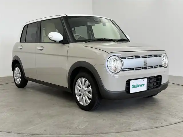 スズキ ラパン X 愛知県 2022(令4)年 1万km フォーンベージュメタリック/ホワイト2トーンルーフ スズキセーフティーサポート/・全方位カメラ/・衝突被害軽減システム/・誤発進抑制機能/・レーンキープアシスト/純正ナビ/（Bluetooth・フルセグテレビ）/前後ドライブレコーダー/ステアリングリモコン/レザー調シートカバー/シートヒーター（D/N）/LEDヘッドライト/コーナーセンサー/純正14インチAW
