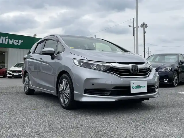 ホンダ シャトル ハイブリッド ホンダセンシング 千葉県 2020(令2)年 1.6万km ルナシルバーM ホンダセンシング/・衝突軽減ブレーキ/・レーンキープアシスト/・標識認識機能/・オートマチックハイビーム/・アダプティブクルーズコントロール/社外SDナビ【CN-B301B】/バックカメラ/スマートキー/社外前後コーナーセンサー/ヘッドライトレベライザー/ビルトインETC