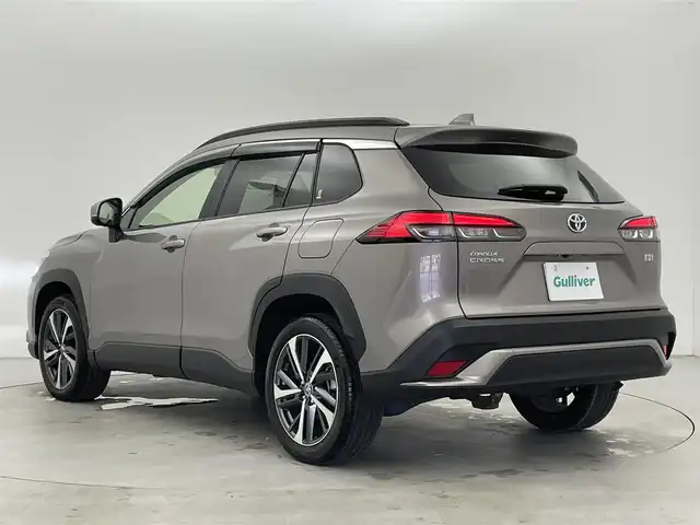 トヨタ カローラ クロス ハイブリッド Z 富山県 2021(令3)年 1.5万km アバンギャルドブロンズメタリック 4WD/純正9型ナビ（AM/FM/BT/Miracast）/フルセグTV/アラウンドビューモニター/パノラマルーフ/寒冷地仕様/プリクラッシュセーフティ/レーダークルーズコントロール/レーンキープアシスト/ブラインドスポットモニター/クリアランスソナー/オートマチックハイビーム/LEDヘッドライト/ハーフレザーシート/前席シートヒーター/ステアリングヒーター/ドライブレコーダー前後/ETC2.0/スマートキー×２/取扱説明書/保証書