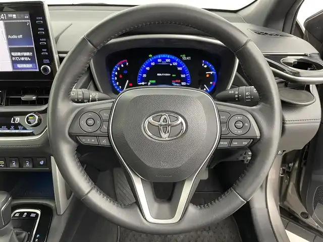 トヨタ カローラ クロス ハイブリッド Z 富山県 2021(令3)年 1.5万km アバンギャルドブロンズメタリック 4WD/純正9型ナビ（AM/FM/BT/Miracast）/フルセグTV/アラウンドビューモニター/パノラマルーフ/寒冷地仕様/プリクラッシュセーフティ/レーダークルーズコントロール/レーンキープアシスト/ブラインドスポットモニター/クリアランスソナー/オートマチックハイビーム/LEDヘッドライト/ハーフレザーシート/前席シートヒーター/ステアリングヒーター/ドライブレコーダー前後/ETC2.0/スマートキー×２/取扱説明書/保証書