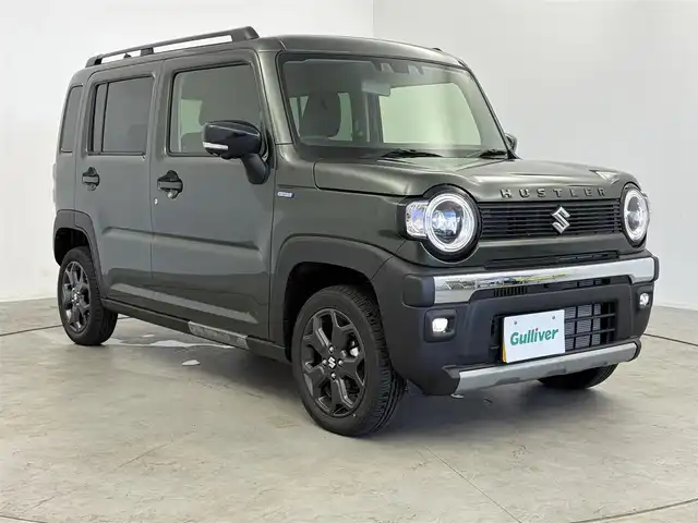 スズキ ハスラー タフワイルド 愛知県 2024(令6)年 0.1千km クールカーキPM 届出済未使用車/純正メモリナビ/（AM/FM、BT、USB、フルセグTV）/スズキコネクト対応通信機装着車/全方位カメラ/レーダークルーズコントロール/デュアルカメラブレーキサポート/誤発進抑制機能/車線逸脱警報機能/盗難防止装置/LEDヘッドライト/ドアバイザー/シートヒータ/オートライト/プッシュスタート/スマートキー