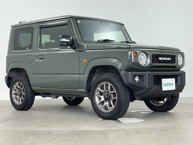 スズキ ジムニー XC 鹿児島県 2022(令4)年 4.7万km ジャングルグリーン 純正8インチSDナビ/(BT/CD/DVD/AM/FM/フルセグTV)/クルーズコントロール/前席シートヒーター/アイドリングストップ/ターボ/バックカメラ/前後ドライブレコーダー/オートマチックハイビーム/ダウンヒルアシストコントロール/スペアキー/4WD/純正LEDヘッドライト/純正フロアマット/純正16インチアルミホイール/ETC/保証書/取扱説明書