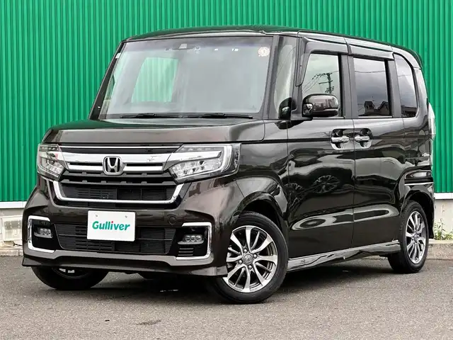 ホンダ Ｎ ＢＯＸ カスタム L 宮城県 2021(令3)年 2.2万km プレミアムグラマラスブロンズP 純正8インチナビ/(フルセグTV/CD/DVD/SD/BT/USB)/バックカメラ/ホンダセンシング/・衝突軽減ブレーキ/・誤発進抑制機能/・後方誤発進抑制機能/・歩行者事故低減ステアリング/・オートハイビーム/・標識認識機能/・路外逸脱抑制機能/・先行車発進お知らせ機能/・アダプティブクルーズコントロール/パーキングセンサーシステム/シートヒーター(D＋N席)/ドライブレコーダー前後/ビルトインETC/両側パワースライドドア/オートエアコン(イオン)/ステアリングスイッチ/オートライト/レベライザー/横滑り防止/サンシェード/プッシュスタート＆スマートキー/ウインカー付き電動格納ミラー/LEDヘッドライト/フォグランプ/純正フロアマット/純正14インチAW