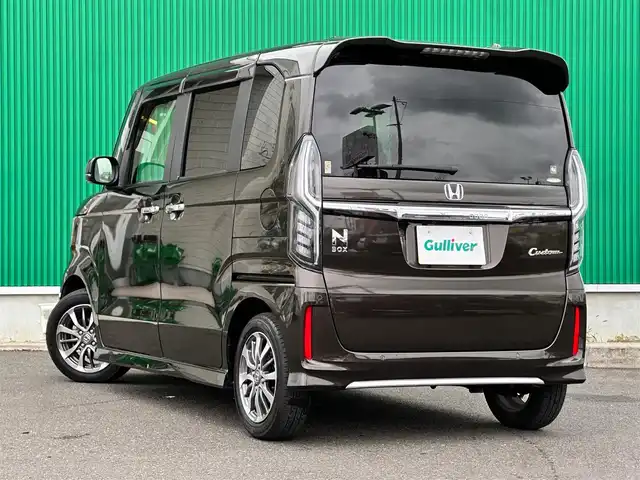 ホンダ Ｎ ＢＯＸ カスタム L 宮城県 2021(令3)年 2.2万km プレミアムグラマラスブロンズP 純正8インチナビ/(フルセグTV/CD/DVD/SD/BT/USB)/バックカメラ/ホンダセンシング/・衝突軽減ブレーキ/・誤発進抑制機能/・後方誤発進抑制機能/・歩行者事故低減ステアリング/・オートハイビーム/・標識認識機能/・路外逸脱抑制機能/・先行車発進お知らせ機能/・アダプティブクルーズコントロール/パーキングセンサーシステム/シートヒーター(D＋N席)/ドライブレコーダー前後/ビルトインETC/両側パワースライドドア/オートエアコン(イオン)/ステアリングスイッチ/オートライト/レベライザー/横滑り防止/サンシェード/プッシュスタート＆スマートキー/ウインカー付き電動格納ミラー/LEDヘッドライト/フォグランプ/純正フロアマット/純正14インチAW