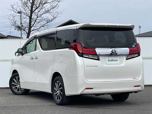 トヨタ アルファード G 岩手県 2015(平27)年 5.4万km ホワイトパールクリスタルシャイン 4WD/プリクラッシュセーフティ/フリップダウンモニター/純正メモリナビ/　　CD/DVD/Bt/フルセグTV/バックカメラ/両側パワースライドドア/パワーバックドア/レーダークルーズコントロール/オートマチックハイビーム/LEDオートライト/フォグランプ/合皮ハーフレザーシート/パワーシート/オットマン/純正17インチアルミホイール/クリアランスソナー/アイドリングストップ/スマートキー/ビルトインETC