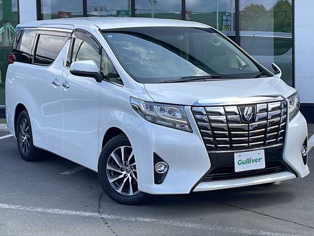 トヨタ アルファード G 道東・釧路十勝 2015(平27)年 5.4万km ホワイトパールクリスタルシャイン ・4WD/・純正10インチメモリナビ/（CD・DVD・BT・AM・FM・フルセグ・）/・バックカメラ/・純正11インチフリップダウンモニター/・プリクラッシュセーフティ/・両側パワースライドドア/・パワーバックドア/・レーダークルーズコントロール/・オートマチックハイビーム/・前方ドライブレコーダー/・LEDオートライト/・フォグランプ/・合皮ハーフレザーシート/・前席パワーシート/・運転席シートメモリー/・助手席オットマン/・クリアランスソナー/・アイドリングストップ/・スマートキー/・プッシュスタート/・ビルトインETC/・純正17インチアルミホイール