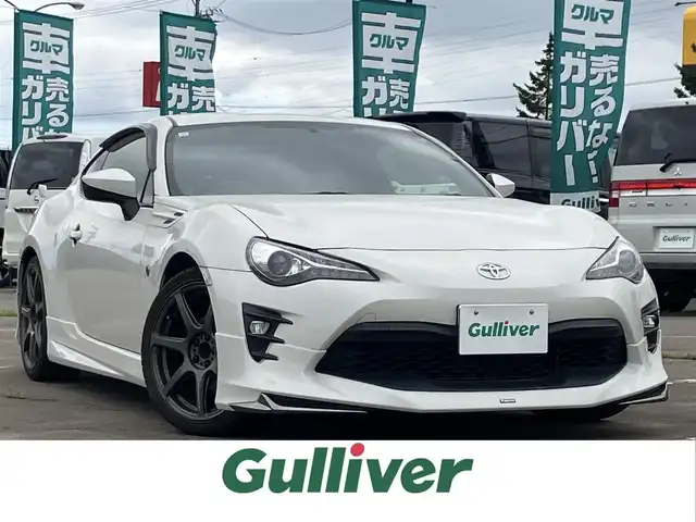 トヨタ ８６ GT リミテッド 道南・函館 2019(平31)年 4.6万km クリスタルホワイトパール ワンオーナー/6MT/モデリスタエアロ/HKSマフラー/BLITZ車高調/WORK18インチアルミホイール/純正SDナビ【NSZT-W68T】/・CD/DVD/MSV/Bluetooth/フルセグ/バックカメラ/ハーフレザーシート/シートヒーター/クルーズコントロール/スマートキー/純正ドライブレコーダー【DRT-C68A】/ETC2.0/純正LEDヘッドライト/ドアバイザー/サイド＆カーテンエアバッグ/新車保証書＆取扱説明書