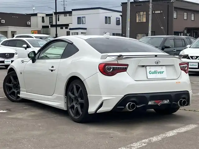 トヨタ ８６ GT リミテッド 道南・函館 2019(平31)年 4.6万km クリスタルホワイトパール ワンオーナー/6MT/モデリスタエアロ/HKSマフラー/BLITZ車高調/WORK18インチアルミホイール/純正SDナビ【NSZT-W68T】/・CD/DVD/MSV/Bluetooth/フルセグ/バックカメラ/ハーフレザーシート/シートヒーター/クルーズコントロール/スマートキー/純正ドライブレコーダー【DRT-C68A】/ETC2.0/純正LEDヘッドライト/ドアバイザー/サイド＆カーテンエアバッグ/新車保証書＆取扱説明書