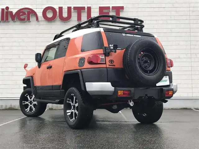 トヨタ ＦＪクルーザー カラーパッケージ 富山県 2014(平26)年 5.9万km オレンジ/ホワイト 4WD/社外ナビ/フルセグTV/Bluetooth/ドライブレコーダー/デジタルインナーミラー/コーナーセンサー/クルーズコントロール/革巻きステアリング/ステアリングスイッチ/背面タイヤ/ルーフレール/ETC