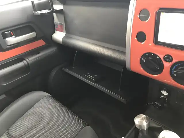 トヨタ ＦＪクルーザー カラーパッケージ 富山県 2014(平26)年 5.9万km オレンジ/ホワイト 4WD/社外ナビ/フルセグTV/Bluetooth/ドライブレコーダー/デジタルインナーミラー/コーナーセンサー/クルーズコントロール/革巻きステアリング/ステアリングスイッチ/背面タイヤ/ルーフレール/ETC