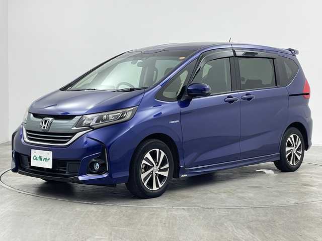 ホンダ フリード＋ ハイブリット EX 群馬県 2018(平30)年 2.4万km コバルトブルーパール ・ホンダ純正ナビ/・バックカメラ/・両側パワースライドドア/・ドライブレコーダー/・ETC/・シートヒーター /・オートライト/・横滑り防止装置/・レーンアシスト /・盗難防止装置/・ABS/・純正フロアマット/・SRSエアバック（運転席/助手席/サイド/カーテン）/・純正１５インチアルミホイール/・LEDヘッドライト