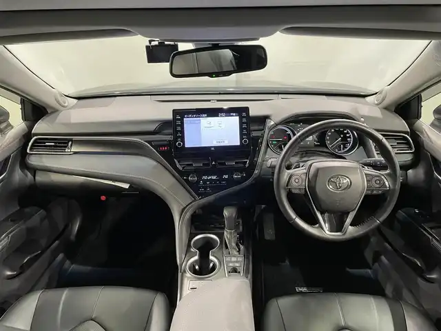 トヨタ カムリ WSレザーパッケージ 愛知県 2021(令3)年 4.6万km アティチュードブラックマイカ 純正9インチディスプレイオーディオナビ/サンルーフ/JBLサウンド/衝突軽減ブレーキ/パノラミックビューモニター/レーダークルーズコントロール/100V電源/ビルトインETC2.0/本革シート/シートヒーター/LEDヘッドライト/フォグランプ/ドライブレコーダー/ブラインドスポットモニター/パワーシート/フルセグTV/Bluetooth/コーナーセンサー/レーンキープアシスト/オートハイビーム/プッシュスタート/スマートキー/DVDデッキ/ミュージックプレイヤー接続/純正フロアマット/純正アルミホイール/オートライト/横滑り防止装置/電動パーキングブレーキ/オートブレーキホールド/ステアリングリモコン/パドルシフト/ヘッドアップディスプレイ/ロードサインアシスト/先行車発進告知
