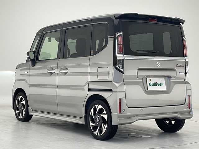スズキ スペーシア カスタム HYBRID XS 沖縄県 2023(令5)年 0.1万km未満 スチールシルバーメタリック/ブルーイッシュブラックパール 社外ディスプレイオーディオ　/ＢＴ接続　/バックカメラ　/両側パワースライドドア　/ドライブレコーダー　/ＥＴＣ　/ＬＥＤヘッドライト　/ハーフレザーシート　/シートヒーター　/オットマン　/プッシュスタート　/スマートキー