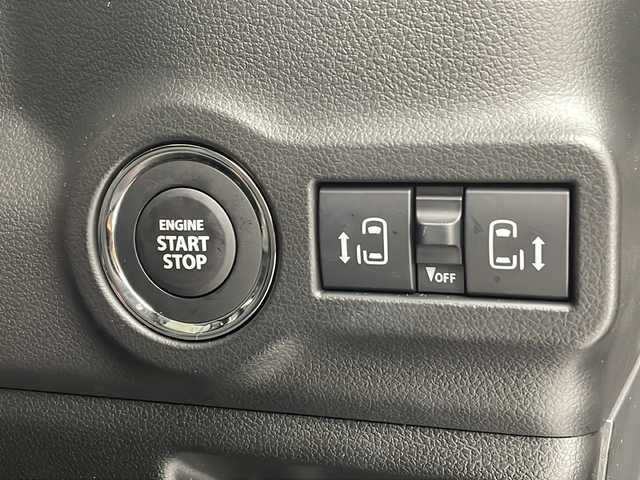 スズキ スペーシア カスタム HYBRID XS 沖縄県 2023(令5)年 0.1万km未満 スチールシルバーメタリック/ブルーイッシュブラックパール 社外ディスプレイオーディオ　/ＢＴ接続　/バックカメラ　/両側パワースライドドア　/ドライブレコーダー　/ＥＴＣ　/ＬＥＤヘッドライト　/ハーフレザーシート　/シートヒーター　/オットマン　/プッシュスタート　/スマートキー