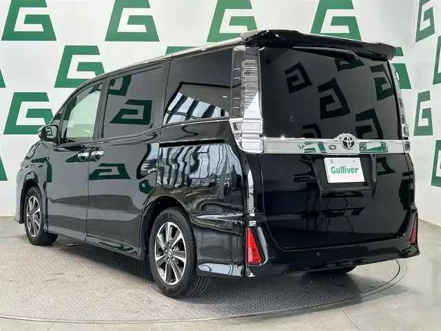 トヨタ ヴォクシー ZS 煌Ⅲ 鹿児島県 2021(令3)年 4.3万km ブラック ワンオーナー/ALPINE9インチナビ/（フルセグテレビ/Bluetooth/DVD）/バックカメラ/ALPINEフリップダウンモニター/トヨタセーフティーセンス/・クルーズコントロール/・オートマチックハイビーム/・プリクラッシュセーフティ・/ビルトインETC/両側パワースライド/ハーフレザーシート/前後ドライブレコーダー/クリアランスソナー/アイドリングストップ/LEDヘッドライト
