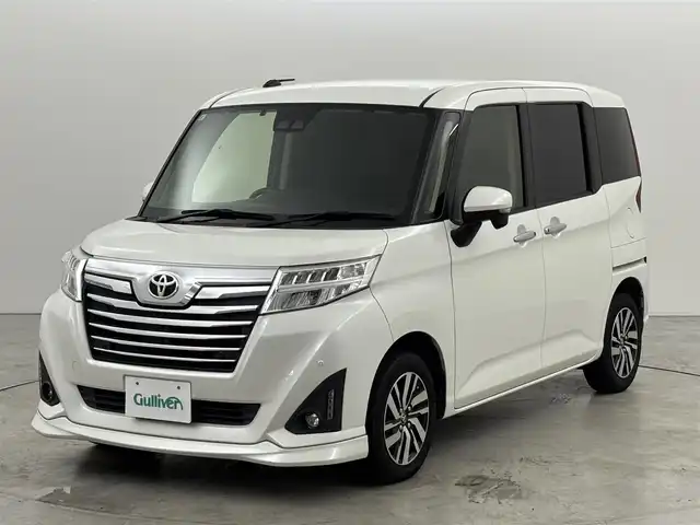 トヨタ ルーミー カスタムG 福岡県 2019(令1)年 5.9万km パールホワイトⅢ ワンオーナー　/純正９型ナビ／フルセグＴＶ　/クルーズコントロール　/コーナーセンサー　/衝突軽減ブレーキ　/アイドリングストップ　/両側電動スライドドア　/シートヒーター　/純正１４インチＡＷ　/ＬＥＤヘッドライト