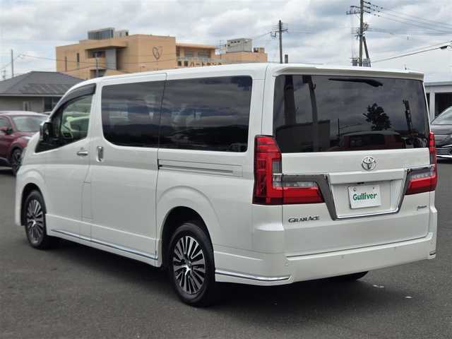 トヨタ グランエース プレミアム 鹿児島県 2020(令2)年 2.7万km ホワイトパールクリスタルシャイン ディーゼルターボ　/ビルトインＥＴＣ　/後席フリップダウンモニター　/デジタルインナーミラー　/全席シートヒーター/D+N席パワーシート　/パノラミックビューモニター　/アダプティブクルーズコントロール　/ドライブレコーダー/トヨタセーフティセンス/レーンキープアシスト/インテリジェントクリアランスソナー/パーキングサポートブレーキ(静止物)/パーキングサポートブレーキ(後方接近車両)/ウェルカムパワースライドドア/スマートエントリー＆プッシュスタートシステム/エグゼクティブパワーシート/横滑り防止装置/前後コーナーセンサー/エアバッグ(W＋サイド)