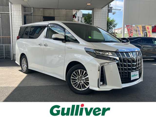 トヨタ アルファードハイブリット SR Cパッケージ 京都府 2018(平30)年 8.7万km ホワイトパールクリスタルシャイン ＪＢＬプレミアムサウンド　/純正ＳＤナビ 10.5インチ/トヨタセーフティセンス/レーダークルーズコントロール/レーンキープアシスト（LTA）/オートマチックハイビーム/プリクラッシュセーフティ（PCS）/ロードサインアシスト（RSA）/パーキングサポートブレーキ（PKSB）/アドバンストパーク/リアクロストラフィックアラート（RCTA）/クリアランスソナー/BSM/ブレーキホールド/置くだけ充電　/ステアリングヒーター/デジタルインナーミラー　/サンシェード　/メモリーパワーシート　/シートヒーター＆ベンチレーター　/バックカメラ　/ドライブレコーダー（ZDR-015）/ナノイー/オールオートパワーウィンドウ/ウィンカーミラー/フォグランプ/スマートキー/プッシュスタート