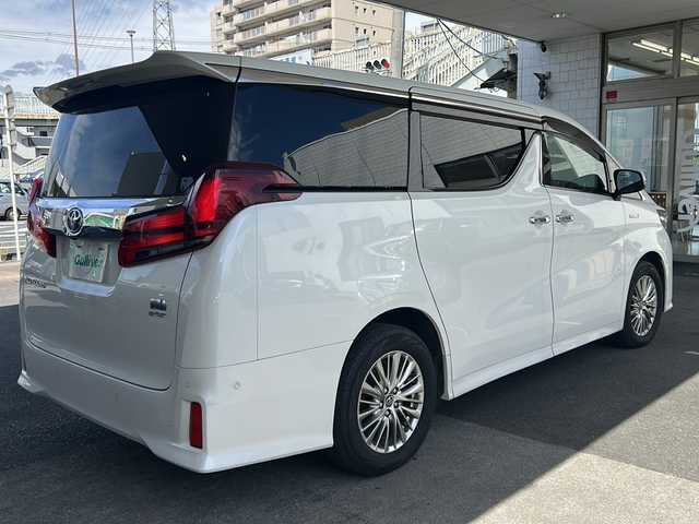 トヨタ アルファードハイブリット SR Cパッケージ 京都府 2018(平30)年 8.7万km ホワイトパールクリスタルシャイン ＪＢＬプレミアムサウンド　/純正ＳＤナビ 10.5インチ/トヨタセーフティセンス/レーダークルーズコントロール/レーンキープアシスト（LTA）/オートマチックハイビーム/プリクラッシュセーフティ（PCS）/ロードサインアシスト（RSA）/パーキングサポートブレーキ（PKSB）/アドバンストパーク/リアクロストラフィックアラート（RCTA）/クリアランスソナー/BSM/ブレーキホールド/置くだけ充電　/ステアリングヒーター/デジタルインナーミラー　/サンシェード　/メモリーパワーシート　/シートヒーター＆ベンチレーター　/バックカメラ　/ドライブレコーダー（ZDR-015）/ナノイー/オールオートパワーウィンドウ/ウィンカーミラー/フォグランプ/スマートキー/プッシュスタート