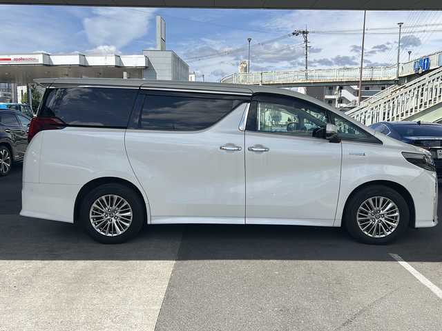 トヨタ アルファードハイブリット SR Cパッケージ 京都府 2018(平30)年 8.7万km ホワイトパールクリスタルシャイン ＪＢＬプレミアムサウンド　/純正ＳＤナビ 10.5インチ/トヨタセーフティセンス/レーダークルーズコントロール/レーンキープアシスト（LTA）/オートマチックハイビーム/プリクラッシュセーフティ（PCS）/ロードサインアシスト（RSA）/パーキングサポートブレーキ（PKSB）/アドバンストパーク/リアクロストラフィックアラート（RCTA）/クリアランスソナー/BSM/ブレーキホールド/置くだけ充電　/ステアリングヒーター/デジタルインナーミラー　/サンシェード　/メモリーパワーシート　/シートヒーター＆ベンチレーター　/バックカメラ　/ドライブレコーダー（ZDR-015）/ナノイー/オールオートパワーウィンドウ/ウィンカーミラー/フォグランプ/スマートキー/プッシュスタート