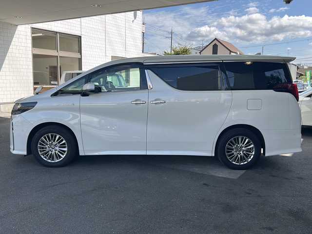 トヨタ アルファードハイブリット SR Cパッケージ 京都府 2018(平30)年 8.7万km ホワイトパールクリスタルシャイン ＪＢＬプレミアムサウンド　/純正ＳＤナビ 10.5インチ/トヨタセーフティセンス/レーダークルーズコントロール/レーンキープアシスト（LTA）/オートマチックハイビーム/プリクラッシュセーフティ（PCS）/ロードサインアシスト（RSA）/パーキングサポートブレーキ（PKSB）/アドバンストパーク/リアクロストラフィックアラート（RCTA）/クリアランスソナー/BSM/ブレーキホールド/置くだけ充電　/ステアリングヒーター/デジタルインナーミラー　/サンシェード　/メモリーパワーシート　/シートヒーター＆ベンチレーター　/バックカメラ　/ドライブレコーダー（ZDR-015）/ナノイー/オールオートパワーウィンドウ/ウィンカーミラー/フォグランプ/スマートキー/プッシュスタート