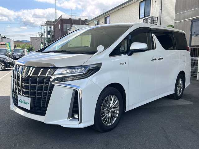 トヨタ アルファードハイブリット SR Cパッケージ 京都府 2018(平30)年 8.7万km ホワイトパールクリスタルシャイン ＪＢＬプレミアムサウンド　/純正ＳＤナビ 10.5インチ/トヨタセーフティセンス/レーダークルーズコントロール/レーンキープアシスト（LTA）/オートマチックハイビーム/プリクラッシュセーフティ（PCS）/ロードサインアシスト（RSA）/パーキングサポートブレーキ（PKSB）/アドバンストパーク/リアクロストラフィックアラート（RCTA）/クリアランスソナー/BSM/ブレーキホールド/置くだけ充電　/ステアリングヒーター/デジタルインナーミラー　/サンシェード　/メモリーパワーシート　/シートヒーター＆ベンチレーター　/バックカメラ　/ドライブレコーダー（ZDR-015）/ナノイー/オールオートパワーウィンドウ/ウィンカーミラー/フォグランプ/スマートキー/プッシュスタート