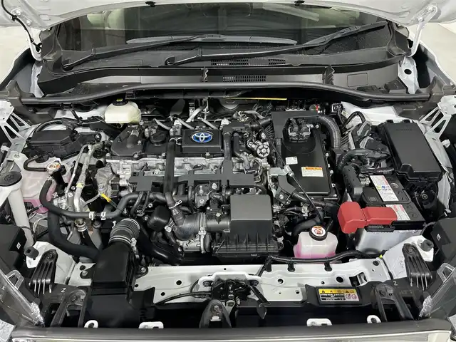 トヨタ カローラ クロス ハイブリッド Z 熊本県 2022(令4)年 1.8万km プラチナホワイトパールマイカ 純正9インチナビ/フルセグTV/Bluetooth/モデリスタエアロ/トヨタセーフティセンス/プリクラッシュセーフティ/レーントレーシングアシスト/ブラインドスポットモニター/クリアランスソナー/パーキングサポートブレーキ/リアクロストラフィックアラート/ロードサインアシスト/全周囲カメラ/オートマチックハイビーム/パワーバックドア/レーダークルーズコントロール/ビルトインETC/ハーフレザーシート/前席シートヒーター/運転席パワーシート/USB入慮/LEDヘッドランプ/ルーフレール/純正18インチアルミホイール/ドアバイザー/フロアマット/スマートキー
