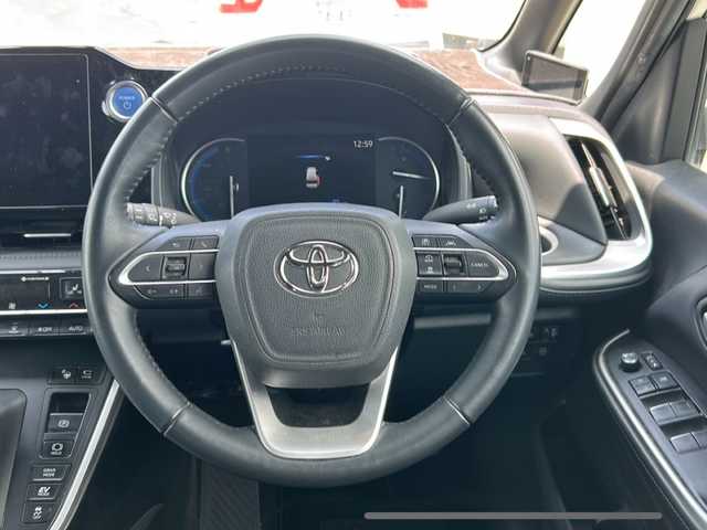 トヨタ ヴォクシー ハイブリッド S－Z 宮崎県 2022(令4)年 7万km ホワイトパールクリスタルシャイン 純正10.5インチナビ/フルセグTV/HDMI入力/純正14インチフリップダウンモニター/パノラマビューモニター/DVDキッド/ETC2.0/ヘッドアップディスプレイ/デジタルインナーミラー/レーダークルーズコントロール/レーンキープアシスト/パーキングアシストコントロール/ハンズフリーデュアルパワースライドドア/パワーバックドア/ステアリングヒーター/キャプテンシート/2列目オットマン/ステアリングリモコン/ドライブレコーダー/オービス対応レーダー/電動格納ミラー/USB充電