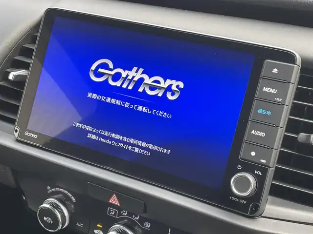 ホンダ フィット e:HEVホーム 福岡県 2021(令3)年 2.5万km クリスタルブラックパール ホンダセンシング/純正９インチナビ（ＶＸＵ－２１５ＦＴｉ）/フルセグTV/CD/DVD/BT/SD/バックカメラ/パーキングセンサー/ＡＣＣ/ドライブレコーダー/ＬＥＤオートライト/オートハイビーム/ビルトインＥＴＣ/スマートキー/プッシュスタート/電動パーキング/ブレーキホールド