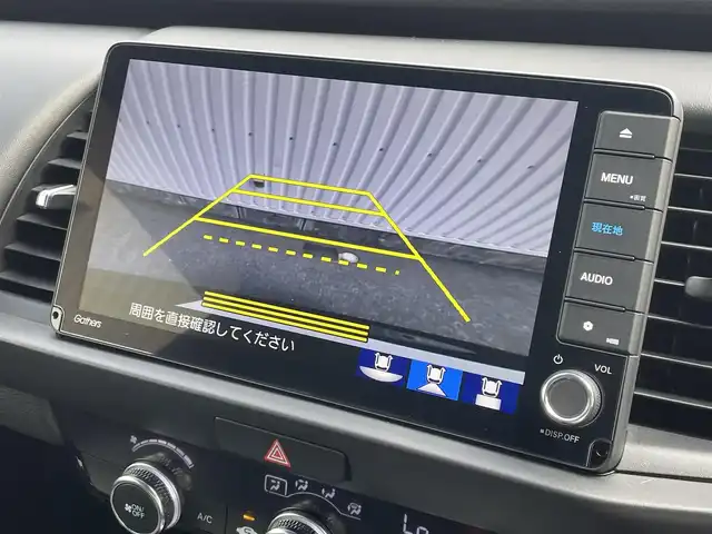 ホンダ フィット e:HEVホーム 福岡県 2021(令3)年 2.5万km クリスタルブラックパール ホンダセンシング/純正９インチナビ（ＶＸＵ－２１５ＦＴｉ）/フルセグTV/CD/DVD/BT/SD/バックカメラ/パーキングセンサー/ＡＣＣ/ドライブレコーダー/ＬＥＤオートライト/オートハイビーム/ビルトインＥＴＣ/スマートキー/プッシュスタート/電動パーキング/ブレーキホールド