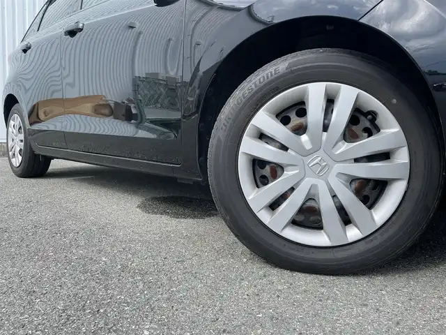 ホンダ フィット e:HEVホーム 福岡県 2021(令3)年 2.5万km クリスタルブラックパール ホンダセンシング/純正９インチナビ（ＶＸＵ－２１５ＦＴｉ）/フルセグTV/CD/DVD/BT/SD/バックカメラ/パーキングセンサー/ＡＣＣ/ドライブレコーダー/ＬＥＤオートライト/オートハイビーム/ビルトインＥＴＣ/スマートキー/プッシュスタート/電動パーキング/ブレーキホールド