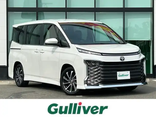 トヨタ ヴォクシー S－Z 和歌山県 2023(令5)年 4.5万km ホワイトパールクリスタルシャイン 純正8インチナビ/バックカメラ/BT/USB/衝突軽減ブレーキ/ブラインドスポットモニター/レーンキープアシスト/前後コーナーセンサー/オートライト/ドラレコ/ビルトインETC2.0/シートヒーター/両側パワスラ/オートホールド/LEＤヘッドライト/ハーフレザーシート