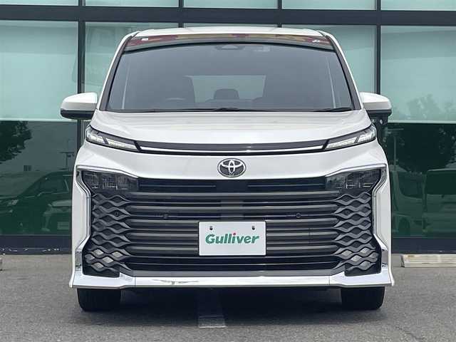 トヨタ ヴォクシー S－Z 和歌山県 2023(令5)年 4.5万km ホワイトパールクリスタルシャイン 純正8インチナビ/バックカメラ/BT/USB/衝突軽減ブレーキ/ブラインドスポットモニター/レーンキープアシスト/前後コーナーセンサー/オートライト/ドラレコ/ビルトインETC2.0/シートヒーター/両側パワスラ/オートホールド/LEＤヘッドライト/ハーフレザーシート