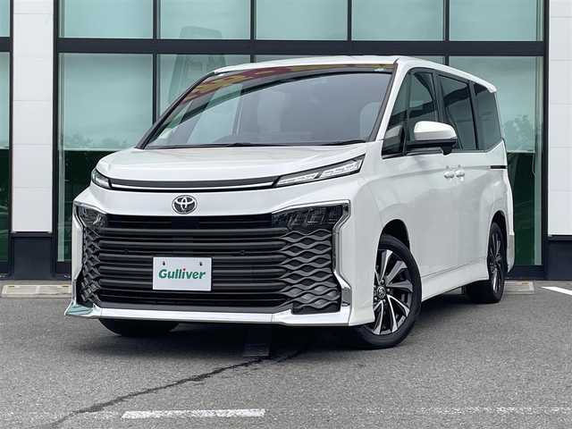 トヨタ ヴォクシー S－Z 和歌山県 2023(令5)年 4.5万km ホワイトパールクリスタルシャイン 純正8インチナビ/バックカメラ/BT/USB/衝突軽減ブレーキ/ブラインドスポットモニター/レーンキープアシスト/前後コーナーセンサー/オートライト/ドラレコ/ビルトインETC2.0/シートヒーター/両側パワスラ/オートホールド/LEＤヘッドライト/ハーフレザーシート