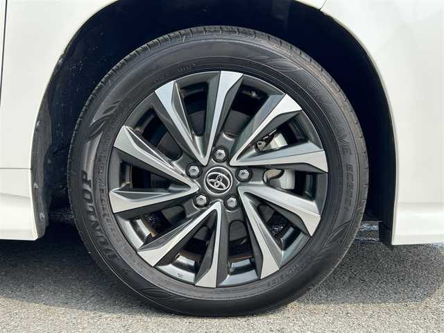 トヨタ ヴォクシー S－Z 和歌山県 2023(令5)年 4.5万km ホワイトパールクリスタルシャイン 純正8インチナビ/バックカメラ/BT/USB/衝突軽減ブレーキ/ブラインドスポットモニター/レーンキープアシスト/前後コーナーセンサー/オートライト/ドラレコ/ビルトインETC2.0/シートヒーター/両側パワスラ/オートホールド/LEＤヘッドライト/ハーフレザーシート