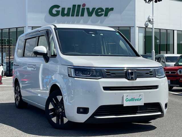 ホンダ ステップワゴン eHEV エアー 長崎県 2022(令4)年 1.5万km プラチナホワイトパール ワンオーナー/純正8インチナビ/CD/DVD/BT/USB/フルセグTV/バックカメラ/両側パワースライドドア/ホンダセンシング/レーダークルーズコントロール/純正ドライブレコーダー/ステアリングスイッチ/純正16インチAW/LEDヘッドライト/ETC